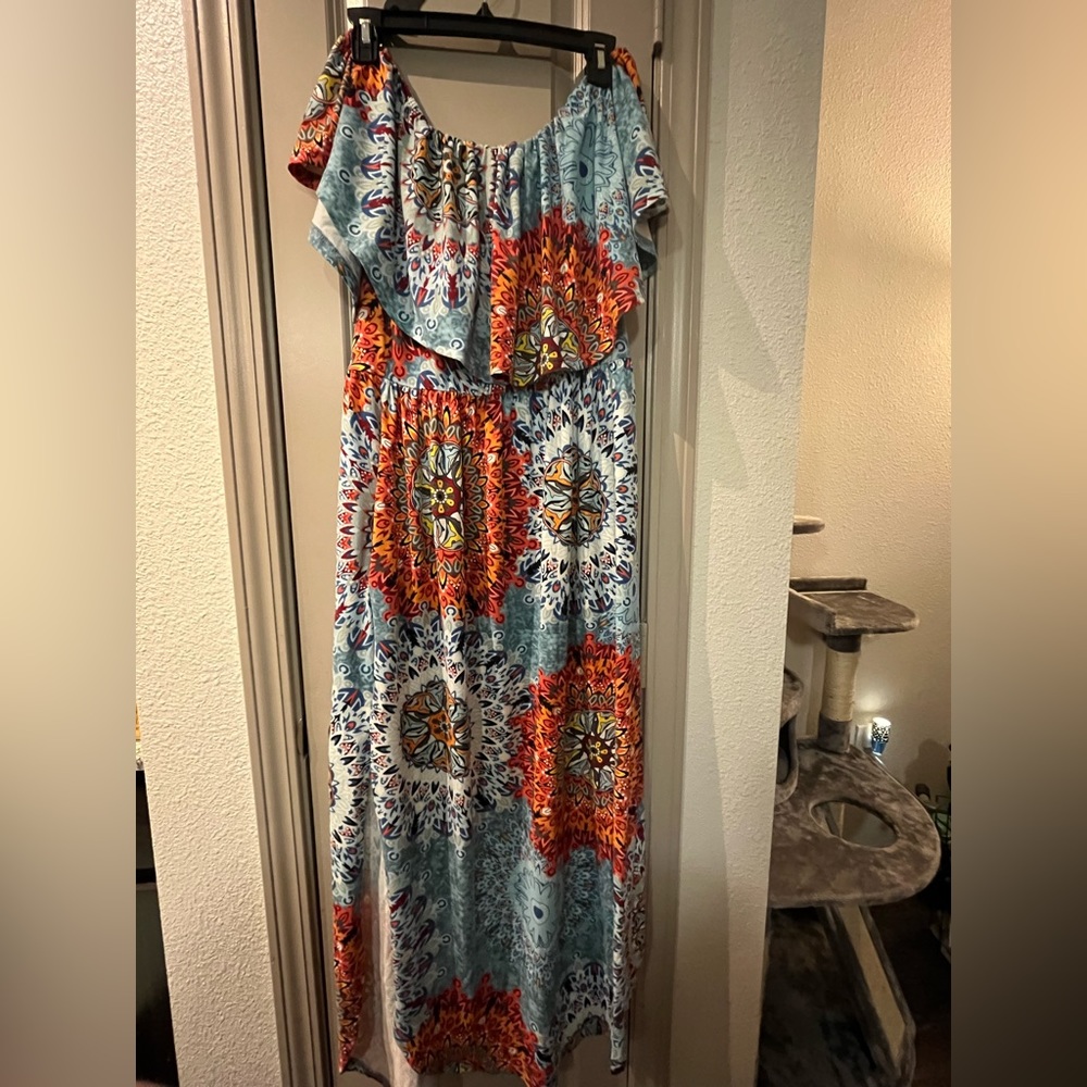 Colorful flowy off the shoulder dress with pockets!